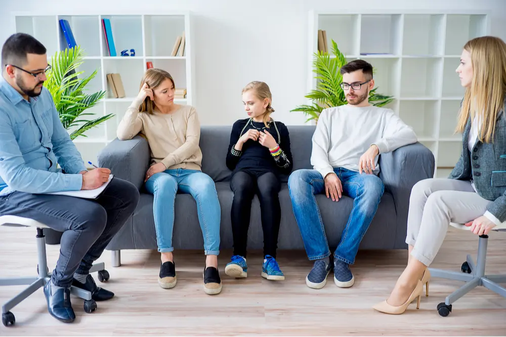 Family members discussing a loved one’s addiction.